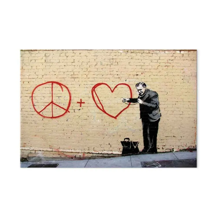 Pazifistischer Arzt (Banksy) - Mann als Street Art auf Backsteinwand